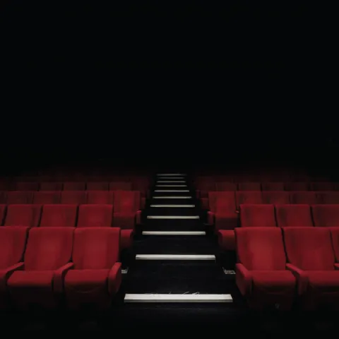 Seats in a Dark Theater